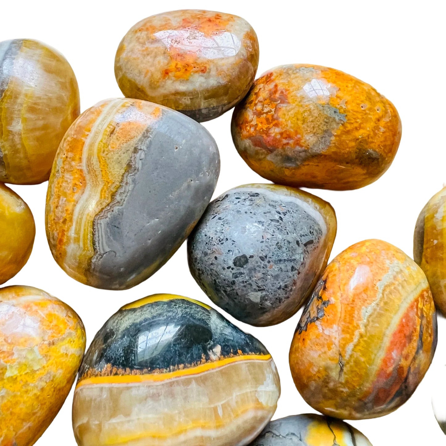 Top-side view of yellow Bumblebee Jasper tumbled stone, sourced from West Java, Indonesia.