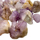Underside view of Quartz raw stone, showing natural texture.