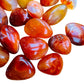 Top-side view of Carnelian tumbled stone, kept near for Energy, from Madagascar.