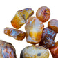 Underside view of Grade A Carnelian raw stone, showing tight grain.