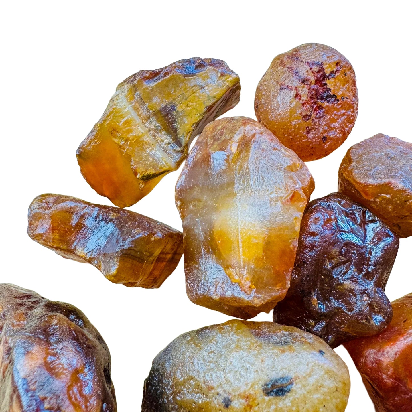 Underside view of Grade A Carnelian raw stone, showing tight grain.