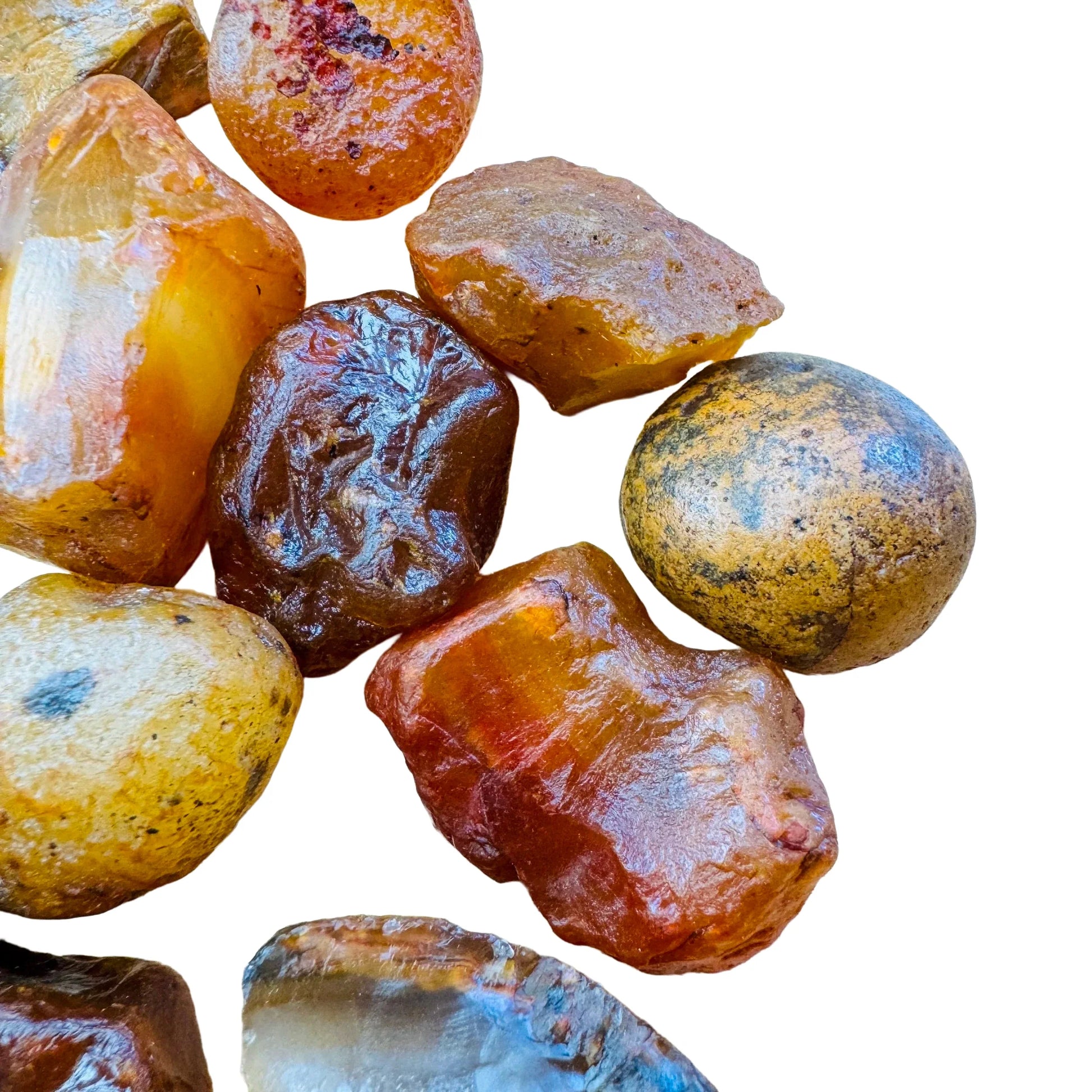 Hand-scale shot of a Carnelian raw stone, sourced from Brazil.