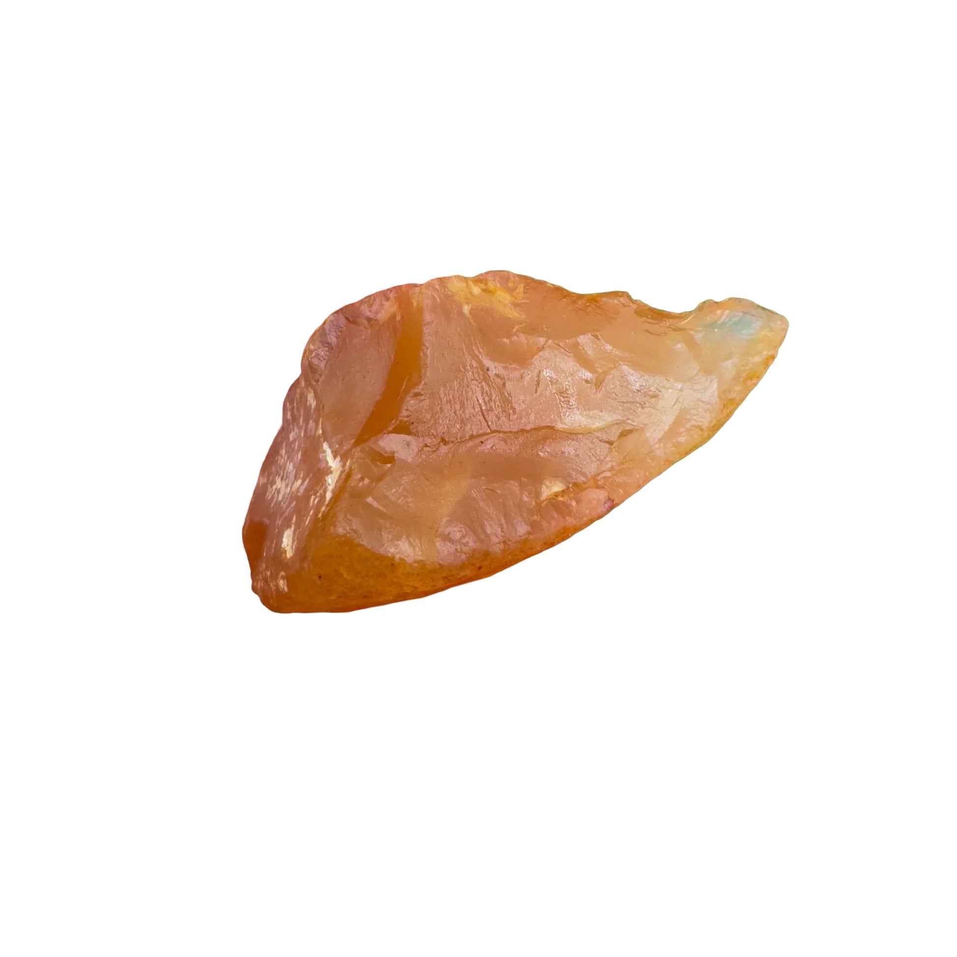 Grade a carnelian raw held in hand for size reference