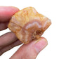 Back view of Grade A Carnelian raw showing natural surface