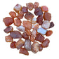 Color detail of Grade A Carnelian raw stone, often paired with practices around Energy and Confidence, showing tight grain.