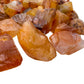 Overhead view of orange Carnelian raw stone, sourced from Rio Grande do Sul, Brazil.