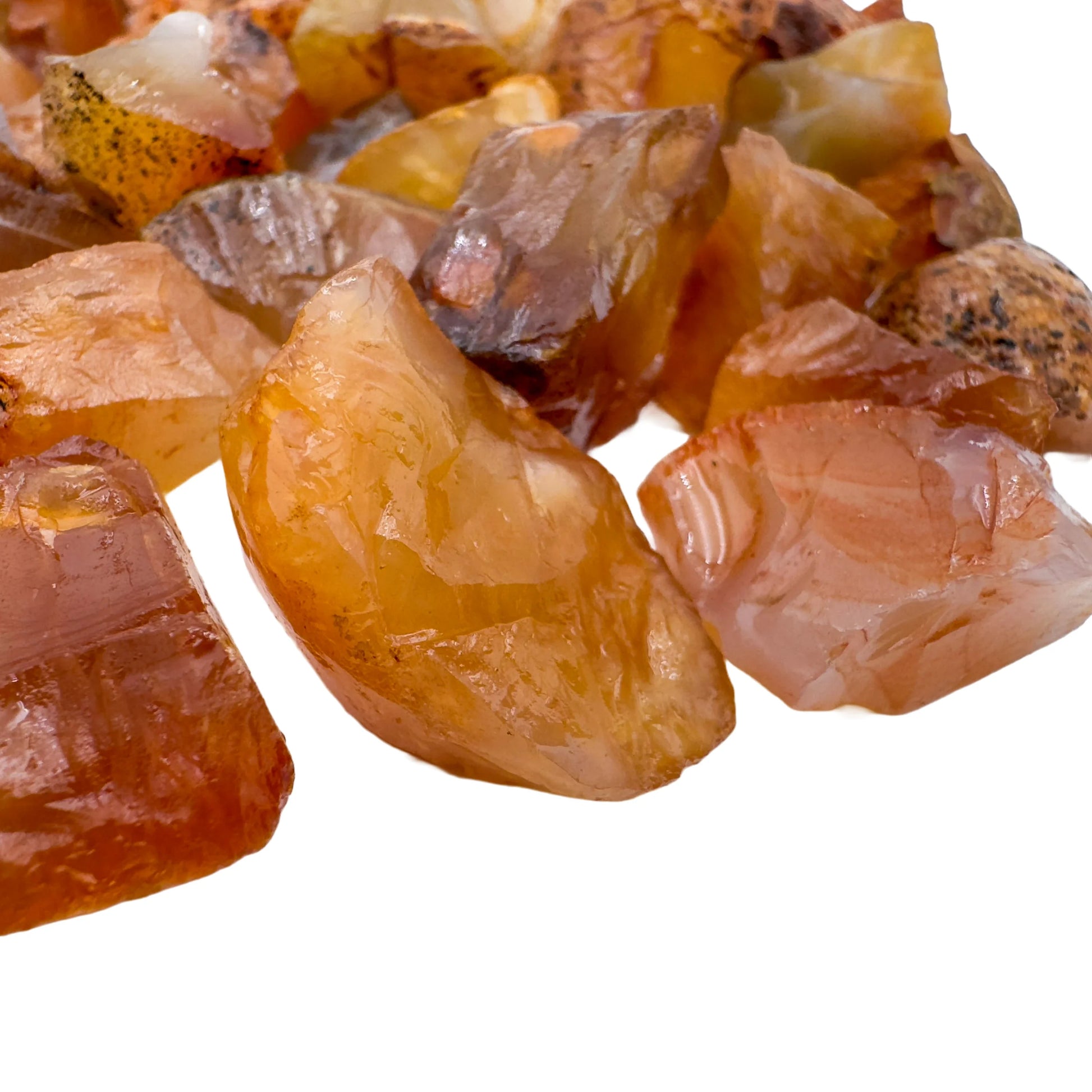 Overhead view of orange Carnelian raw stone, sourced from Rio Grande do Sul, Brazil.