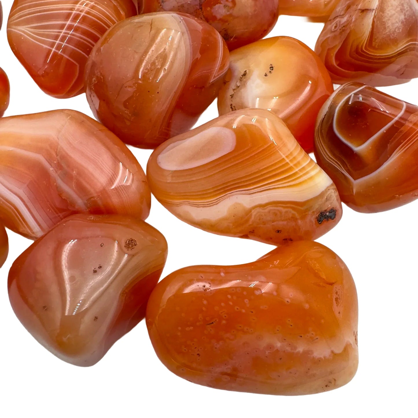 Profile view of Carnelian tumbled stone, kept near for Energy, from Francistown, Botswana.