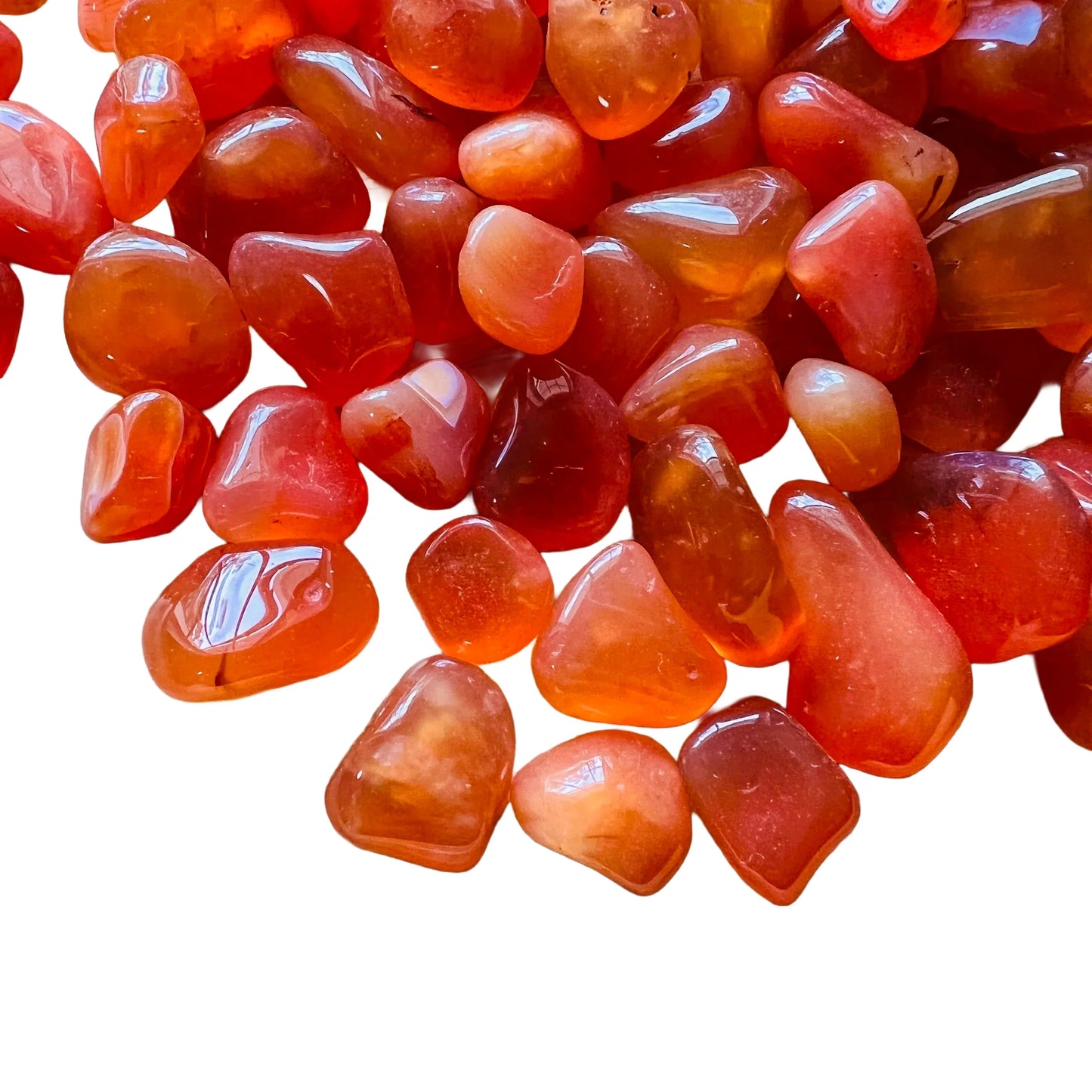 Texture-level view of orange Carnelian tumbled stone, turned to for Energy and Confidence, Botswana-sourced.