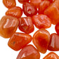 Top view of Carnelian tumbled stone, worked with for Energy, hand-selected from Francistown, Botswana.