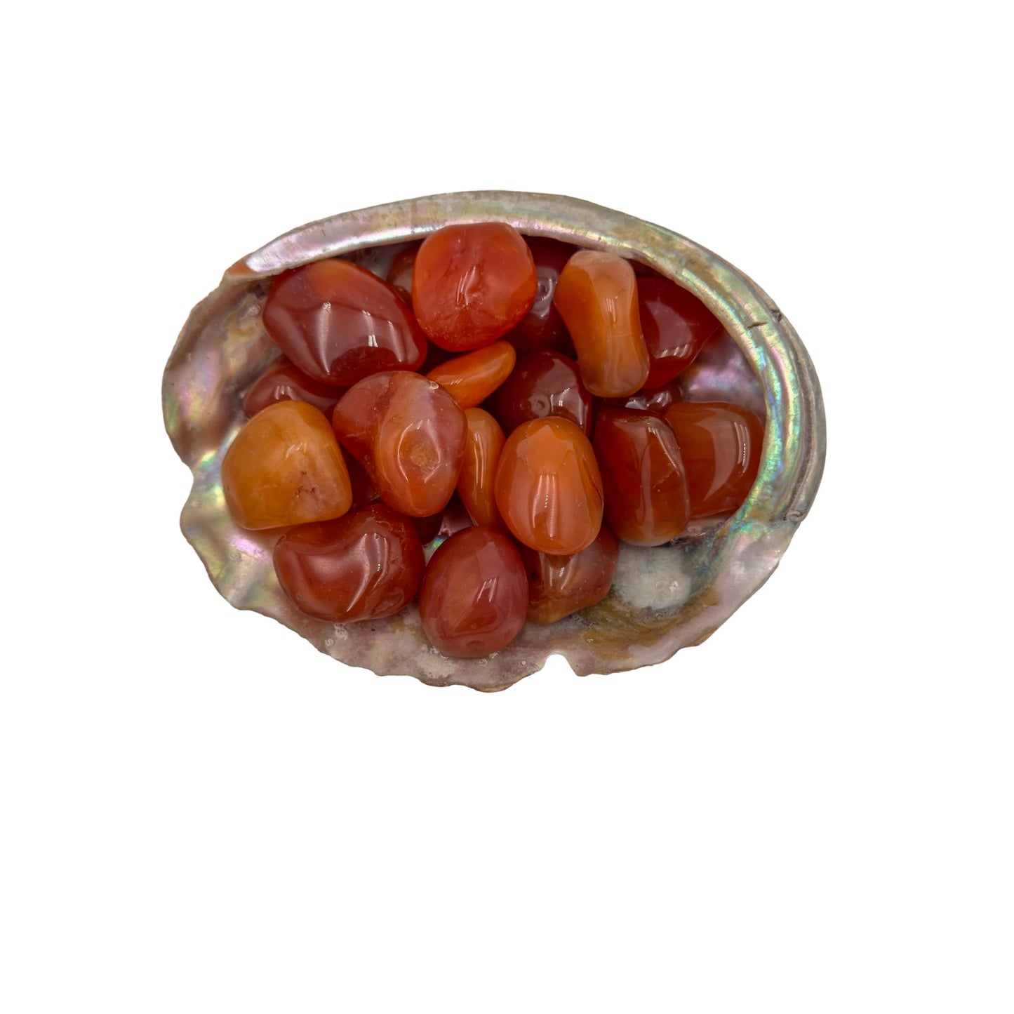 Near view of Carnelian tumbled stone, showing earthy tone, often kept for Energy.