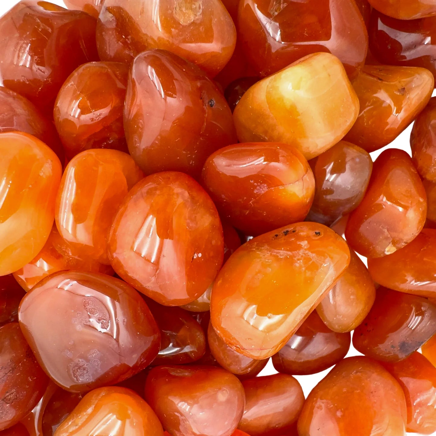 Lateral view of Carnelian tumbled stone, showing matte finish.