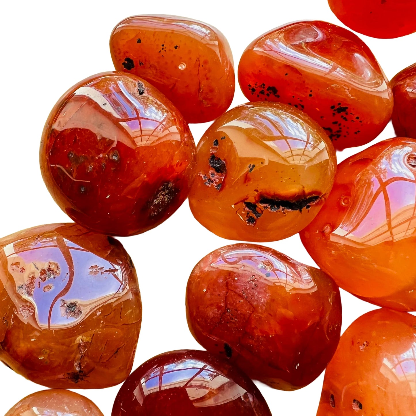 Top view of Carnelian tumbled stone, showing soft luster, often paired with practices around Energy.