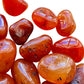 Alternate angle of Carnelian tumbled stone, Brazil-sourced.