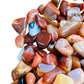 Profile shot of Carnelian tumbled stone, showing characteristic patterning.