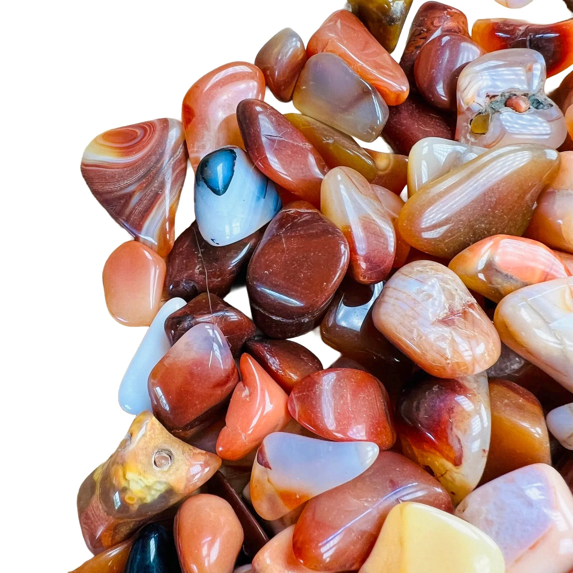 Profile shot of Carnelian tumbled stone, showing characteristic patterning.