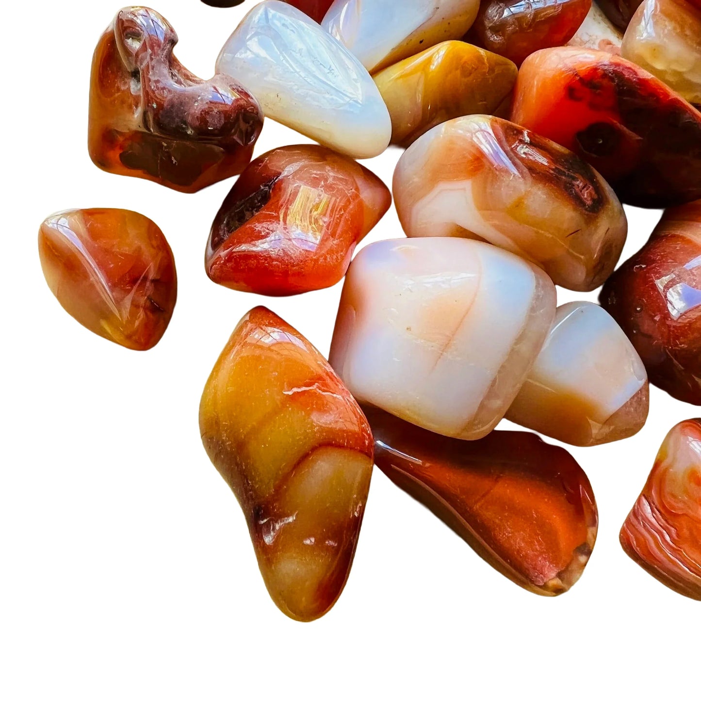 Side-on view of Carnelian tumbled stone, showing earthy tone.
