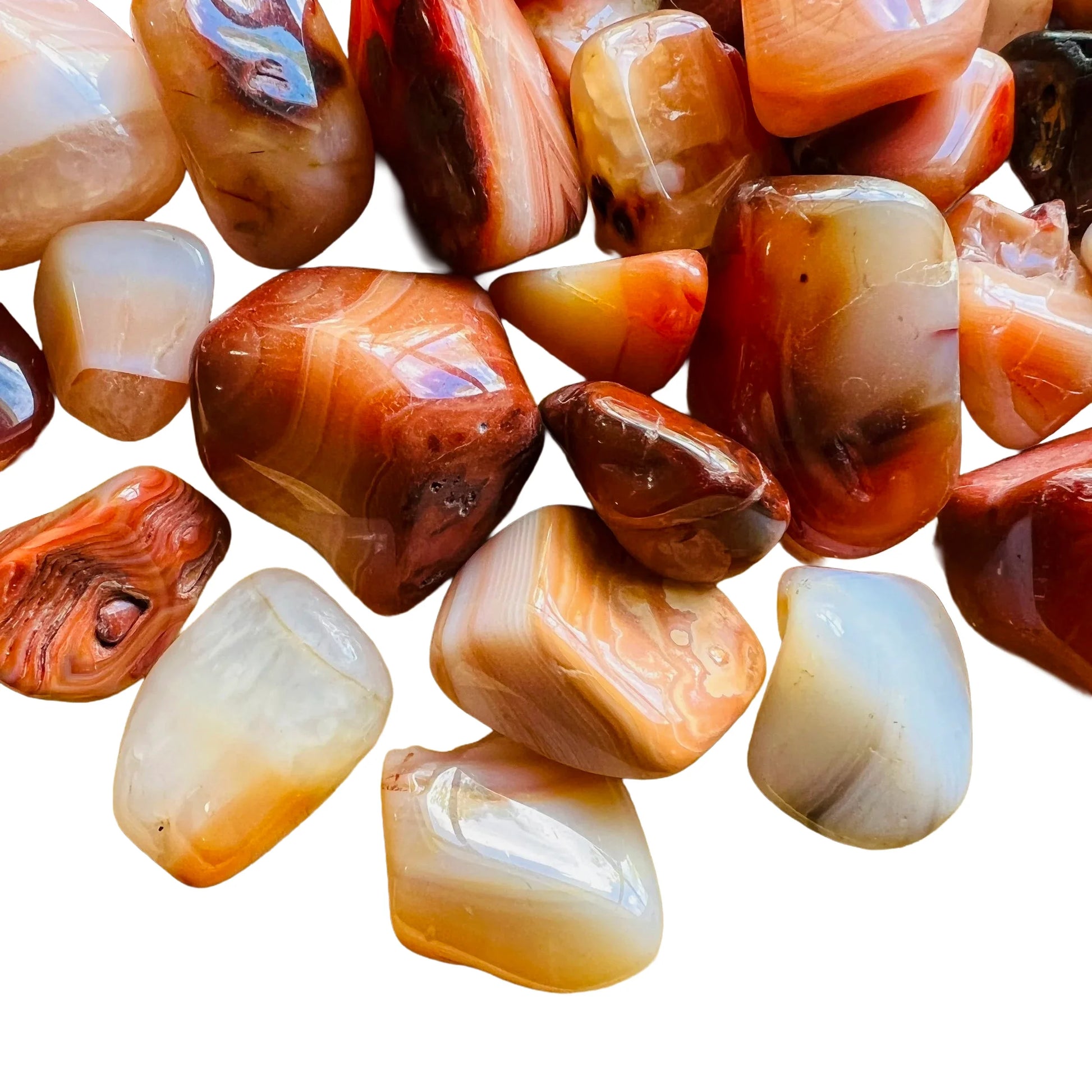 Overhead view of Carnelian tumbled stone, often worked with for Energy and Confidence.