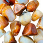 Full profile of Grade AA Carnelian tumbled stone ready to ship from Beyond Bohemian