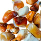 Full profile of Grade AA Carnelian tumbled stone ready to ship from Beyond Bohemian