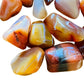 Top angle of Grade AA Carnelian tumbled stone, often paired with practices around Energy, showing natural sheen.