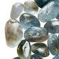 Side-on view of Grade AA Celestite tumbled stone, from Sakoany, Madagascar, traditionally used for Stress Relief and Sleep.