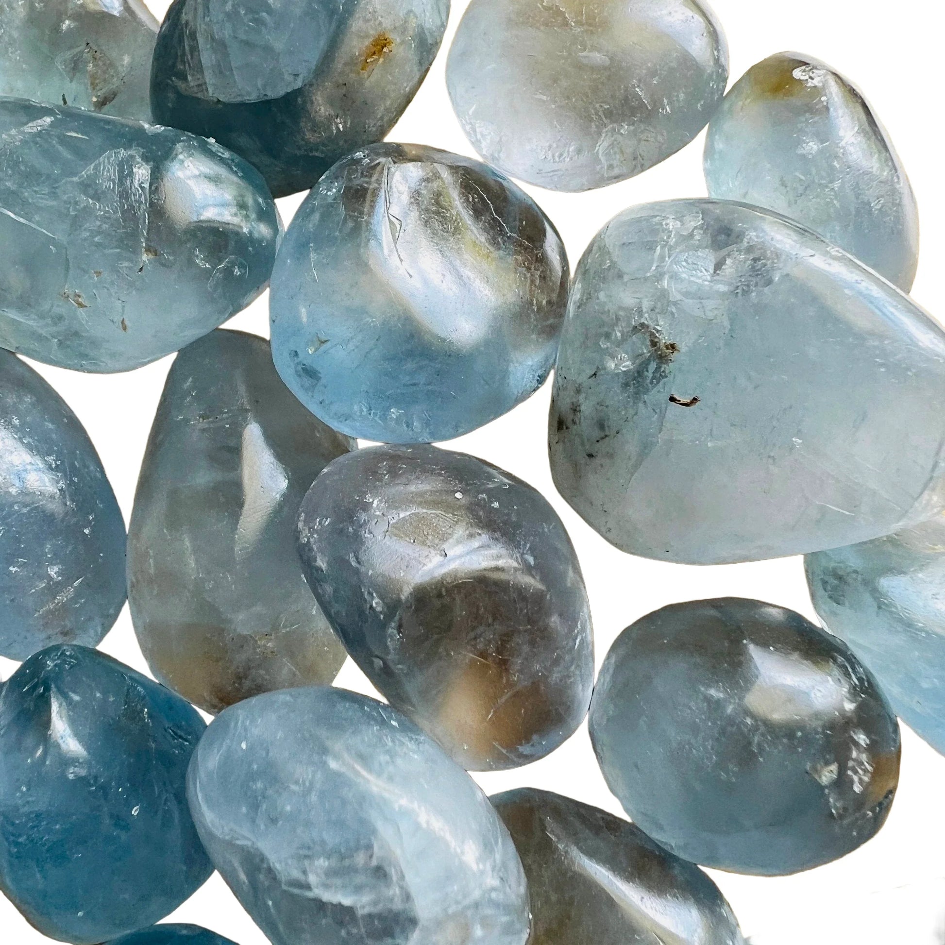 Natural light view of a single Celestite tumbled stone from Madagascar.