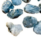 In-hand view of a single Celestite raw stone from Madagascar.