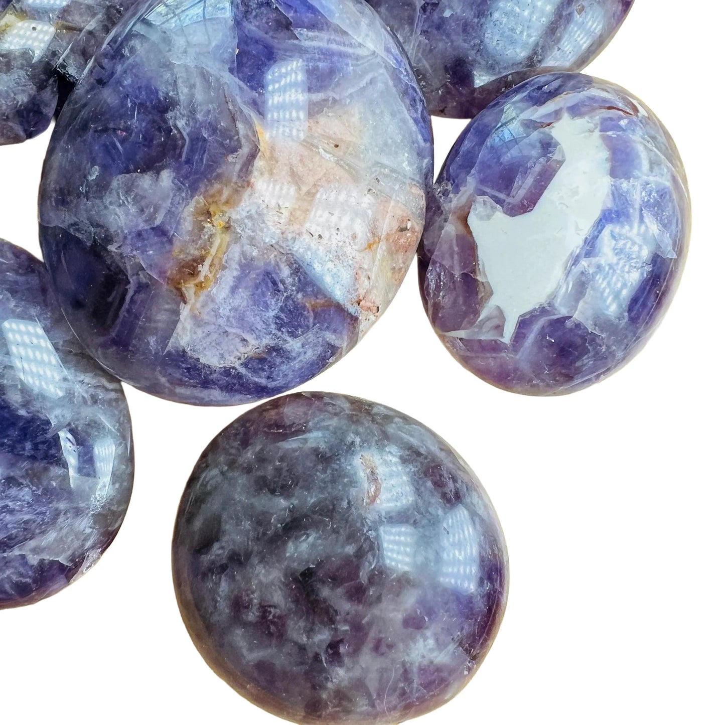 Top-side view of Chevron Amethyst palm stone, from Madagascar.