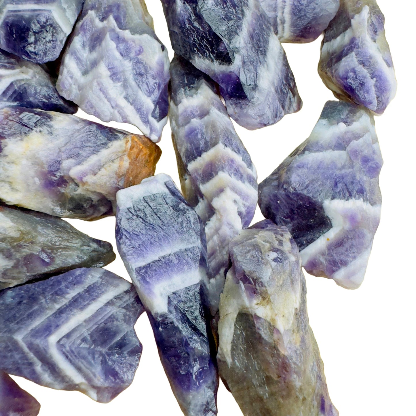 Overhead angle of Grade AA purple Chevron Amethyst raw stone, Zambia-sourced, to support Intuition.