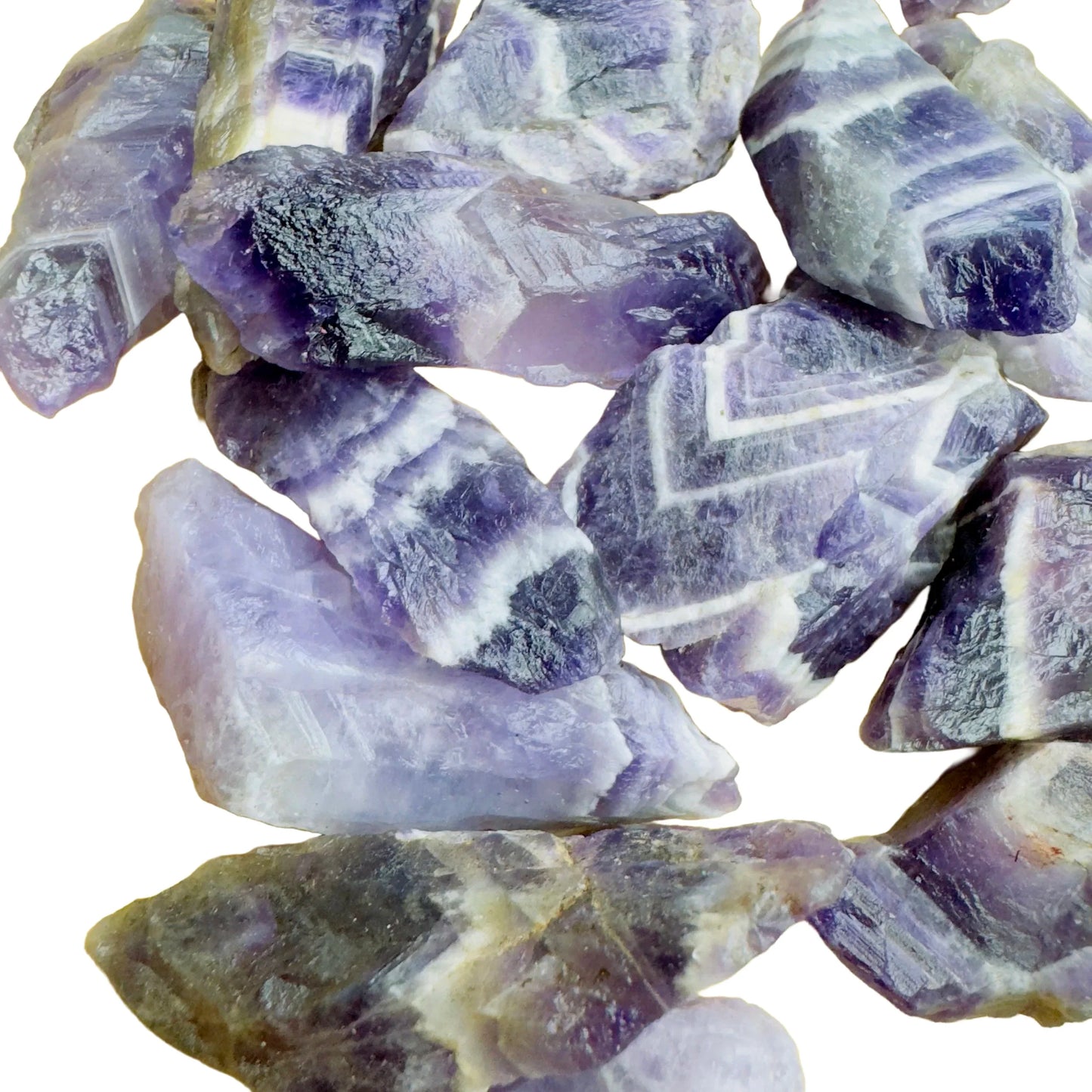 Reverse angle of Chevron Amethyst raw stone, showing natural color depth, Zambia-sourced.