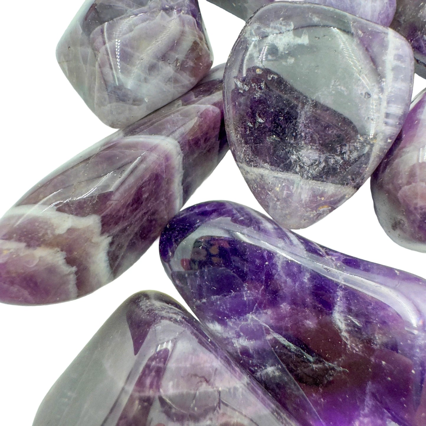 Reverse side of Grade AA Chevron Amethyst tumbled stone, showing matte finish.