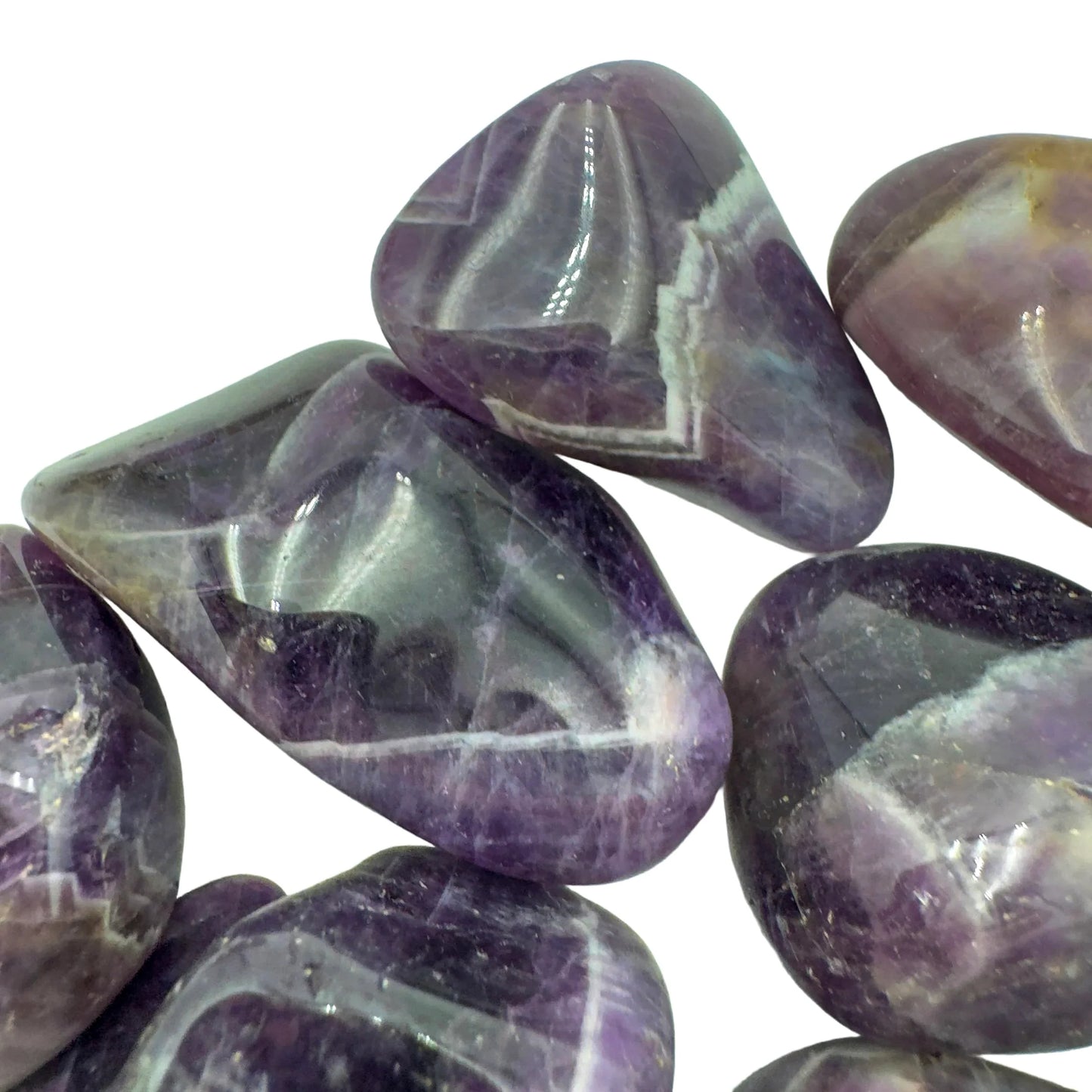 Back view of Grade AA Chevron Amethyst tumbled stone showing natural surface