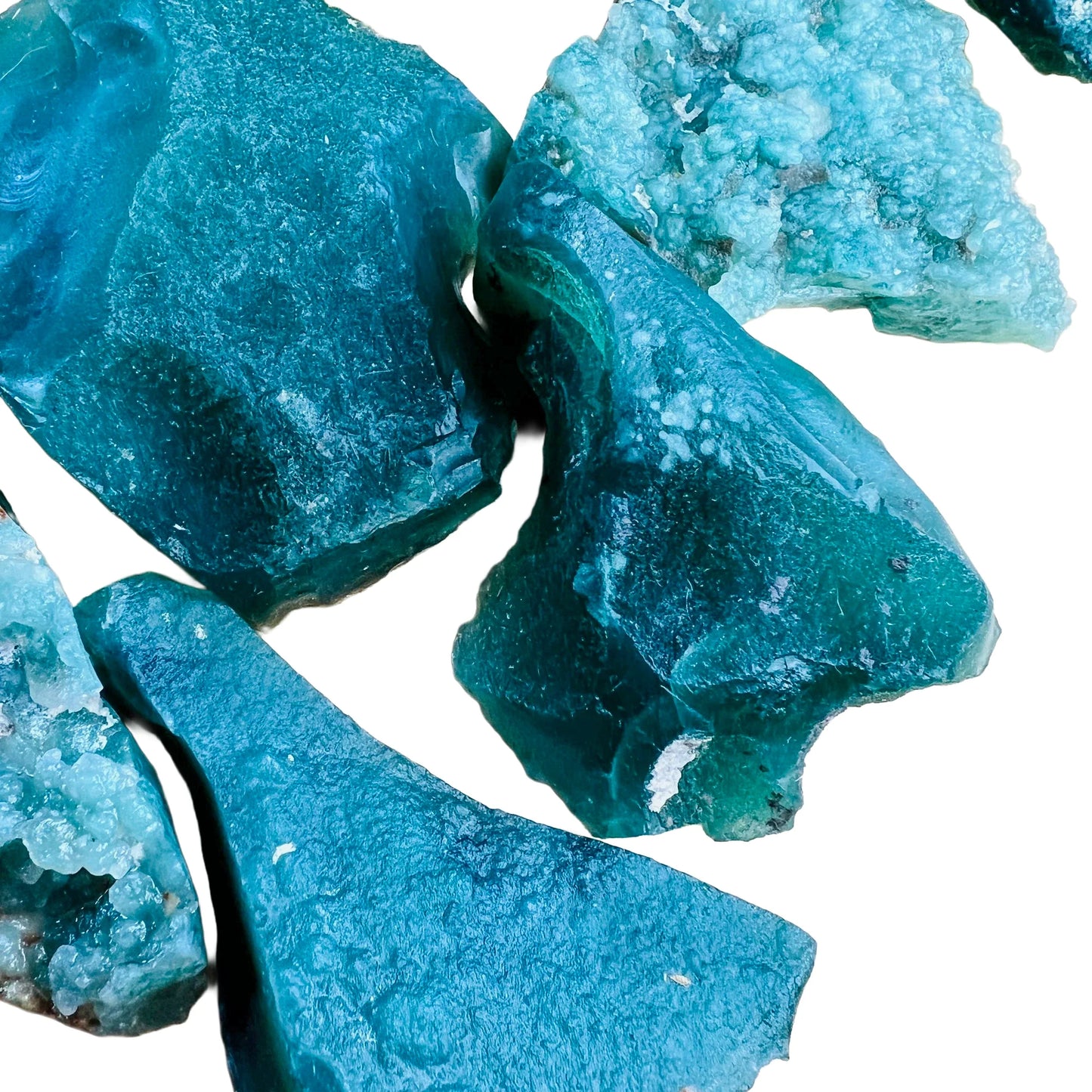 Side profile of Chalcedony raw stone, kept close for Stress Relief and Confidence, showing tight grain.