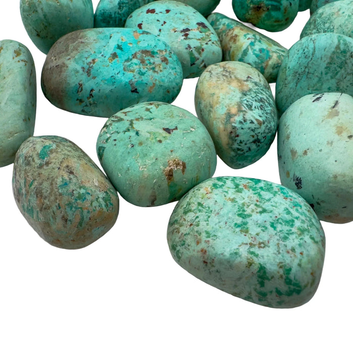 Detail of blue Chrysocolla tumbled stone, sourced from Peru.