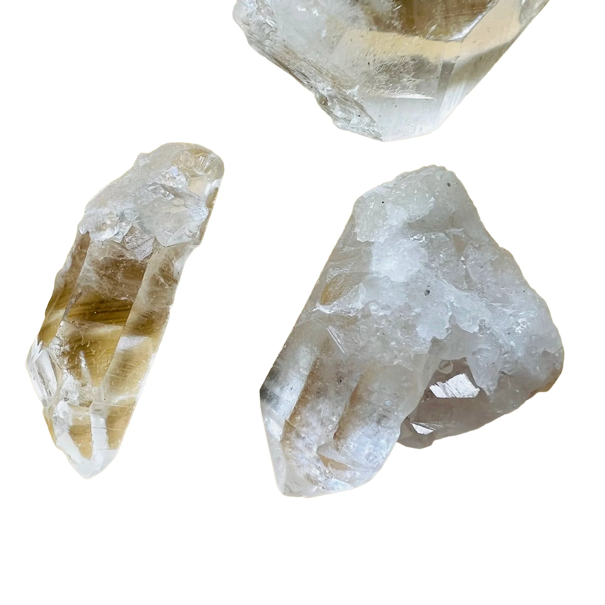 Side-on view of Clear Quartz raw point, showing characteristic color.