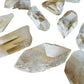 Opposite side of Clear Quartz raw point, showing characteristic finish, United States-sourced.