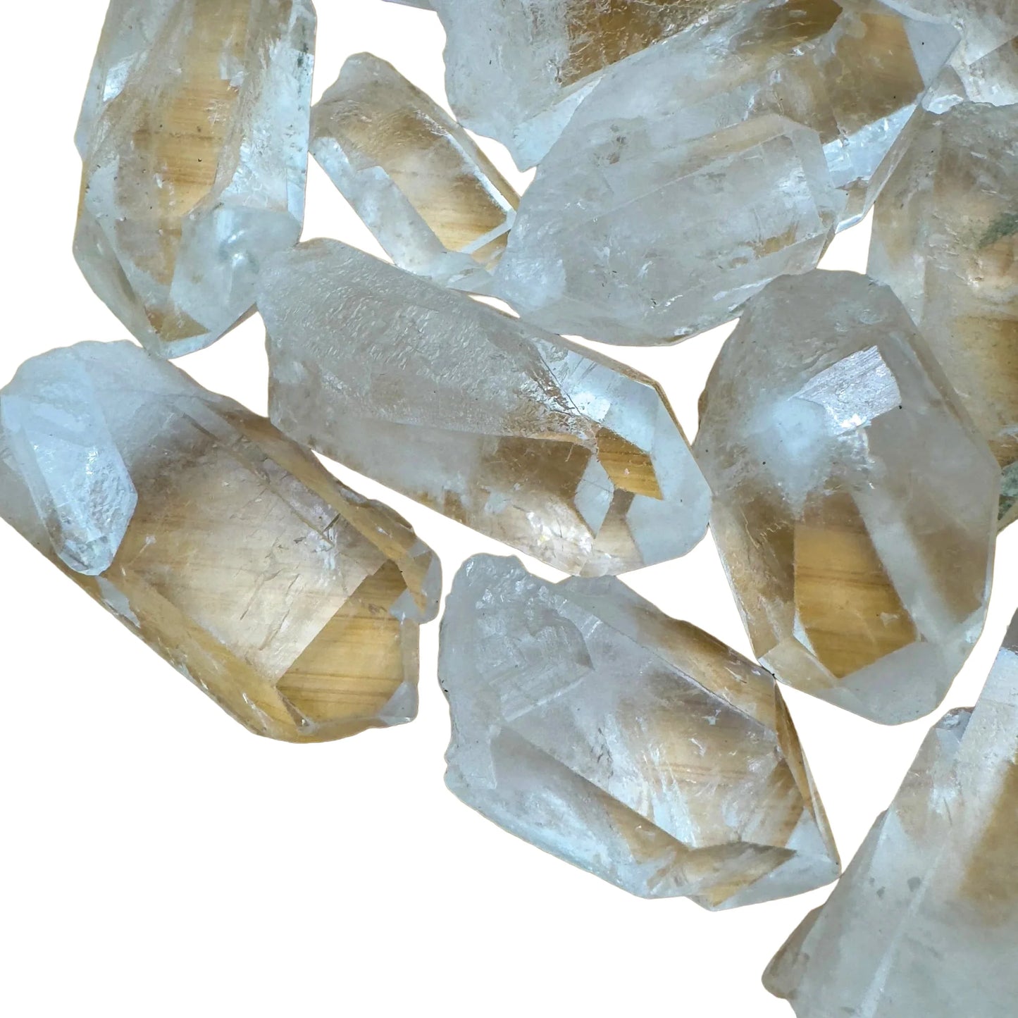 Side profile of Clear Quartz raw point, showing subtle veining, to support Cleansing.