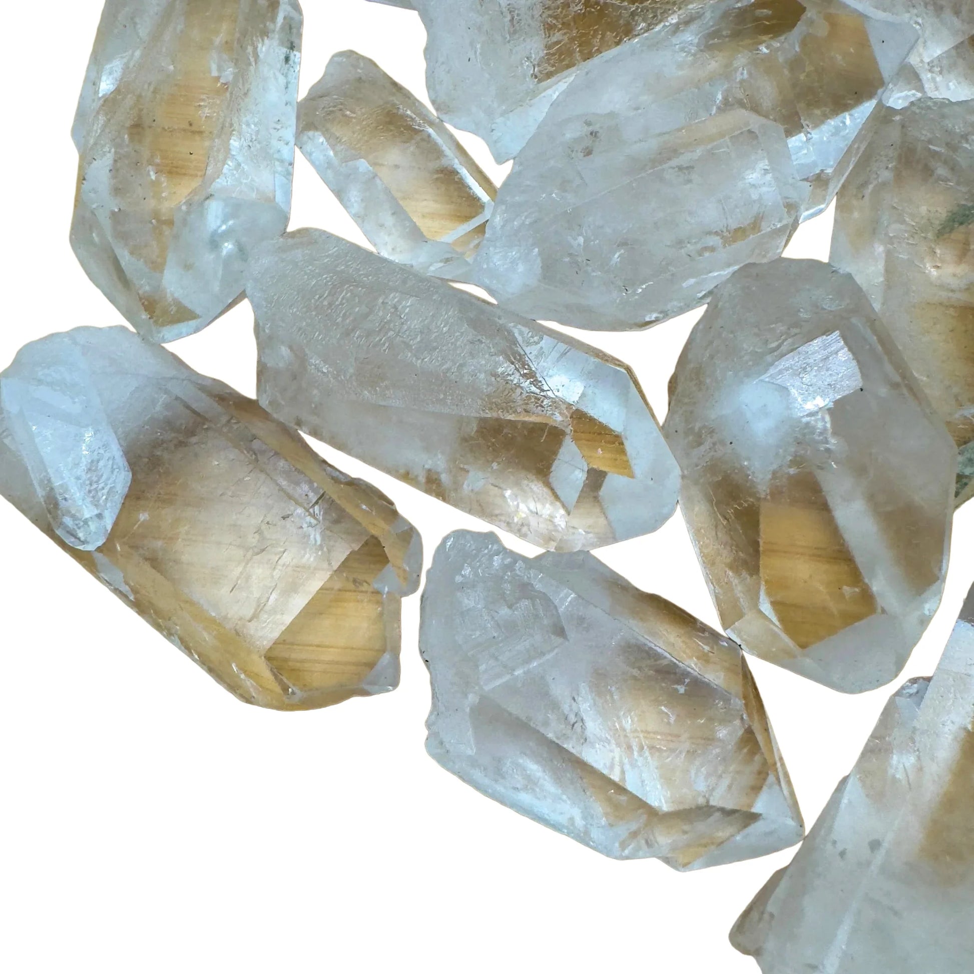 Side profile of Clear Quartz raw point, showing subtle veining, to support Cleansing.