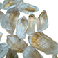 Bird's-eye view of Grade AA Clear Quartz raw point, showing natural texture.