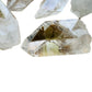 Close detail of Clear Quartz raw point, showing natural inclusions.