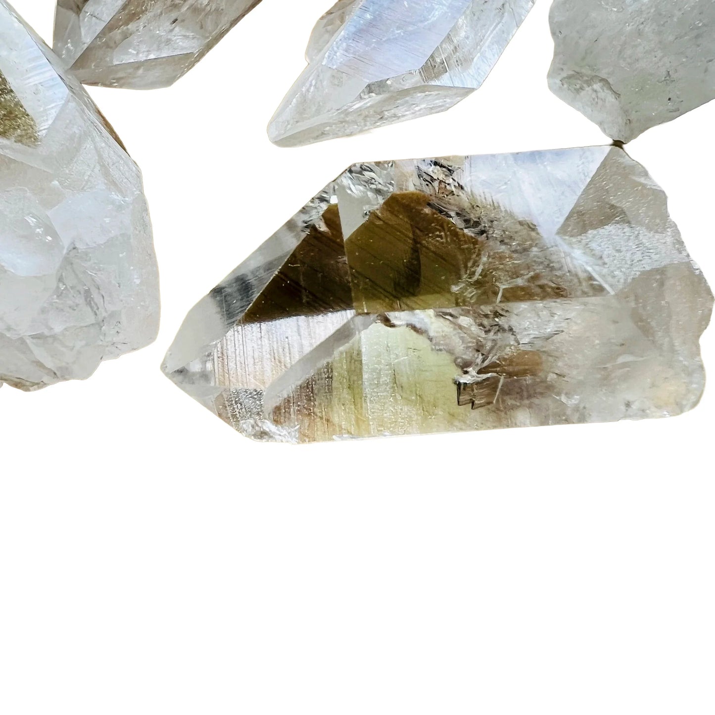 Close detail of Clear Quartz raw point, showing natural inclusions.
