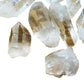Bird's-eye view of Grade AAA Clear Quartz raw point, showing characteristic patterning, from United States.