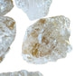 Side profile of Grade AA Clear Quartz raw stone, often worked with for Cleansing, sourced from Brazil.