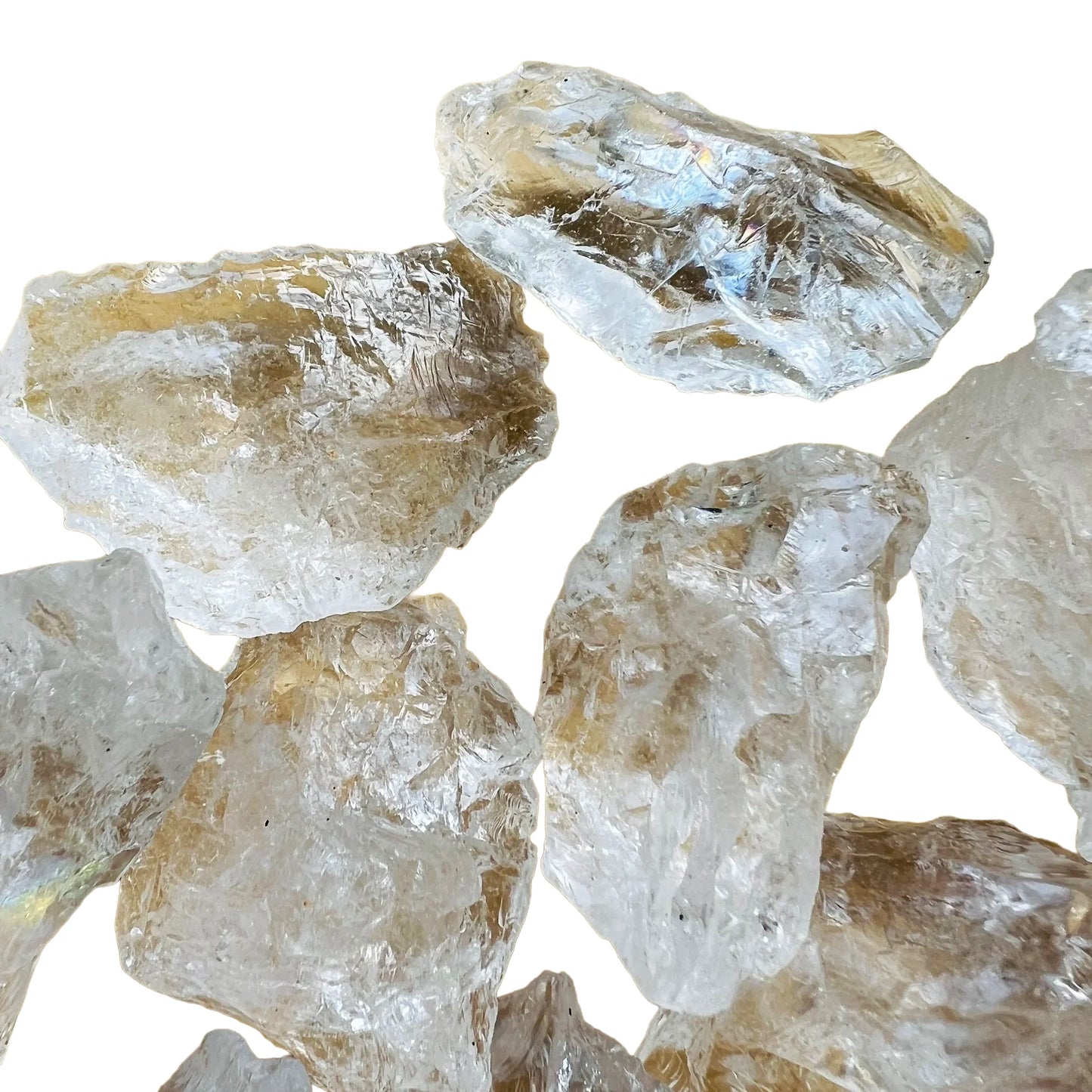 Detail shot showing Clear Quartz raw stone, hand-selected from Minas Gerais, Brazil, showing natural texture.