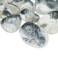 Side view of Clear Quartz tumbled stones showing deep crystalline clarity, hand-polished AAA grade from Minas Gerais