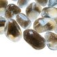 Near view of Grade AAA Clear Quartz tumbled stone, sourced from Minas Gerais, Brazil.