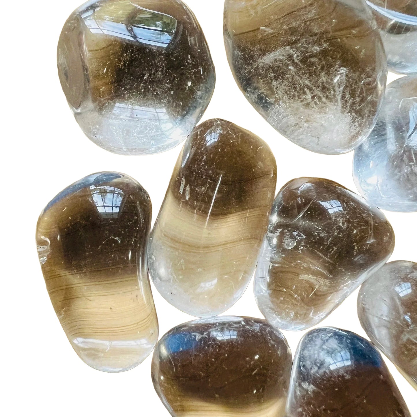 Side angle of Clear Quartz tumbled stone, kept close for Cleansing and Meditation, Brazil-sourced.