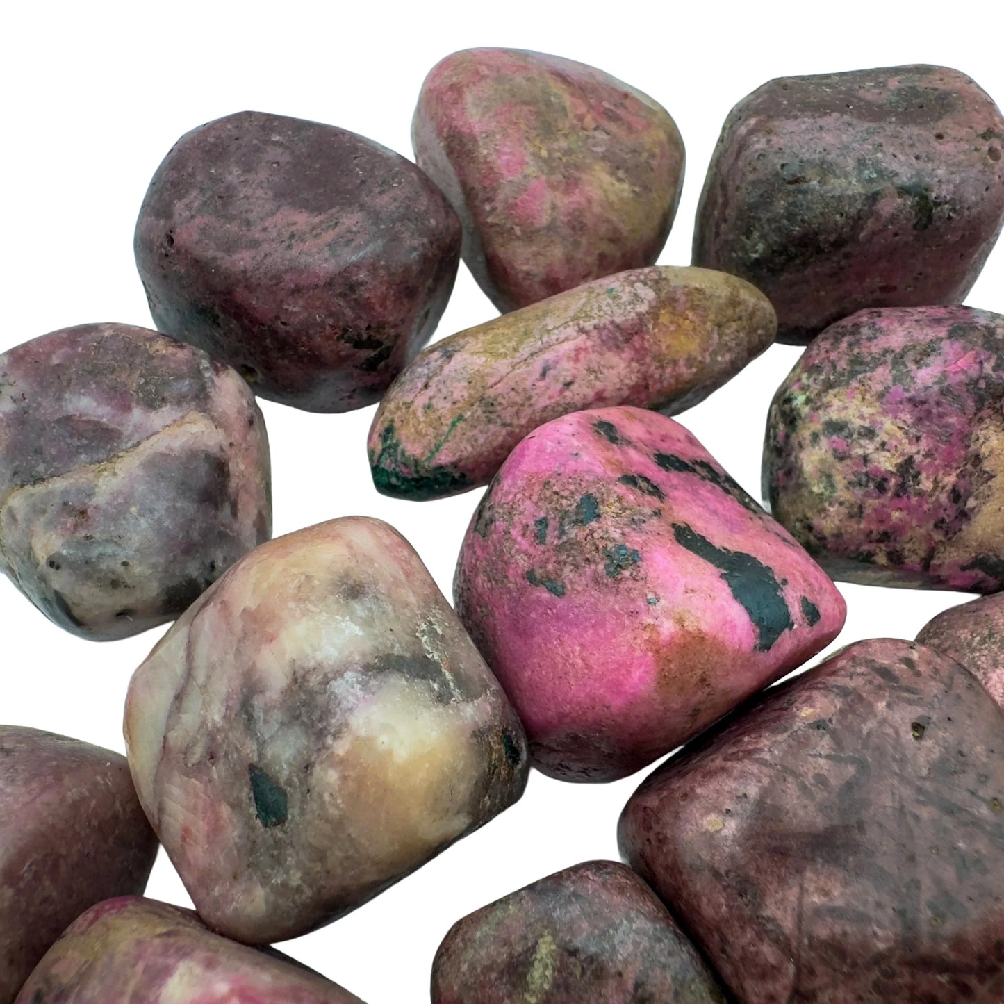 Top angle of Grade A Cobalt Calcite tumbled stone, hand-selected from Haut-Lomami, Democratic Republic of the Congo, kept near.
