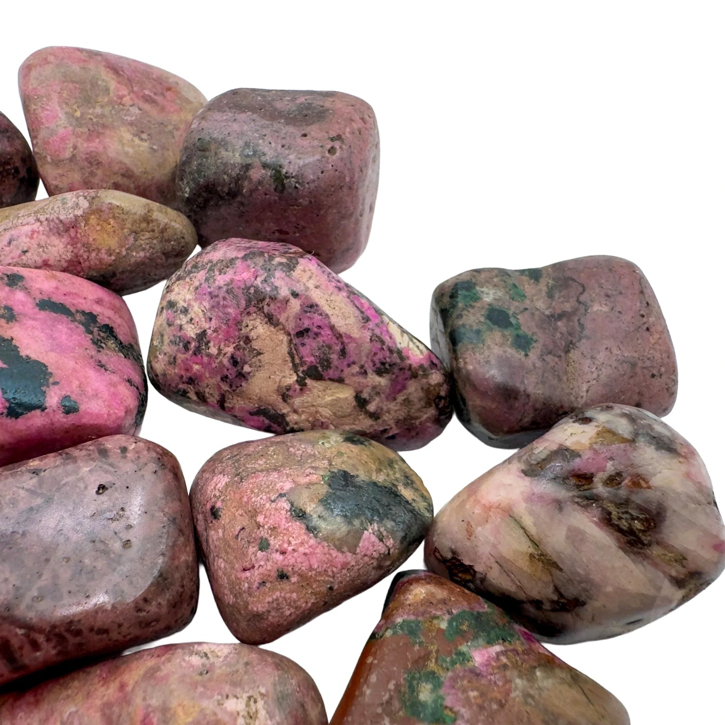 Underside view of pink Cobalt Calcite tumbled stone, sourced from Haut-Lomami, Democratic Republic of the Congo.